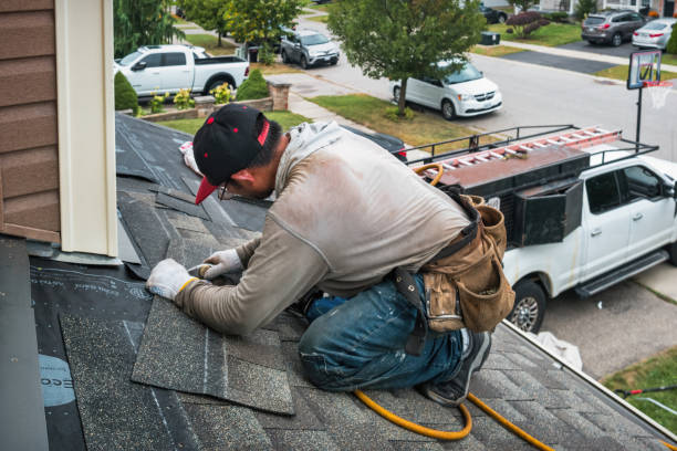 Professional Roof Replacement technician working in Rootstown, OH